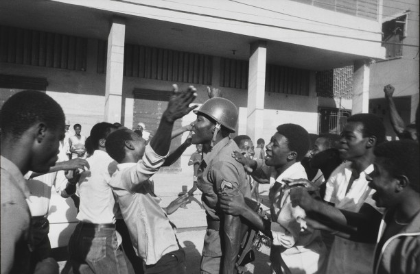 The soldier is greeted as hero.  February 7th, Port-au-Prince
